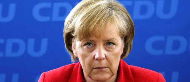 Меркель: "Мы пока не можем снять санкции с России"