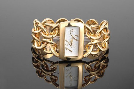Стильные и оригинальные золотые женские часы 