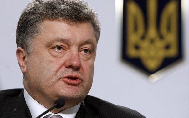 Украинский активист был арестован за растоптанный портрет Порошенко