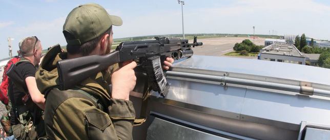 Вместо отвода вооружений под Донецком зафиксированны автоматные очереди